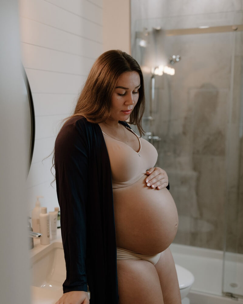pregnant woman in the bathroom