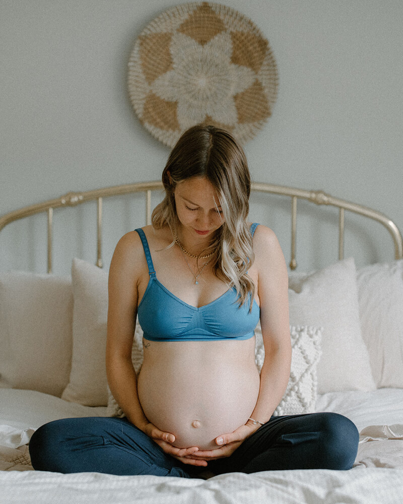 pregnant woman wearing seamless knitted nursing bra