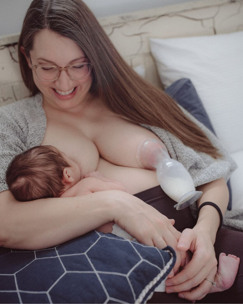 woman breastfeeding and pumping