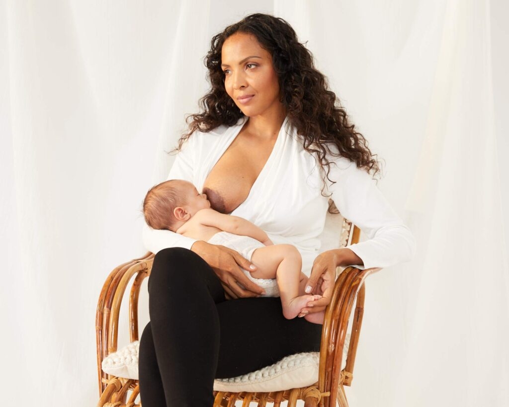 breastfeeding mother wearing nursing top and lounge pants