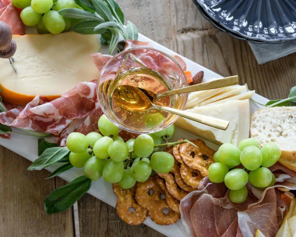 cheese, deli meat and green grapes