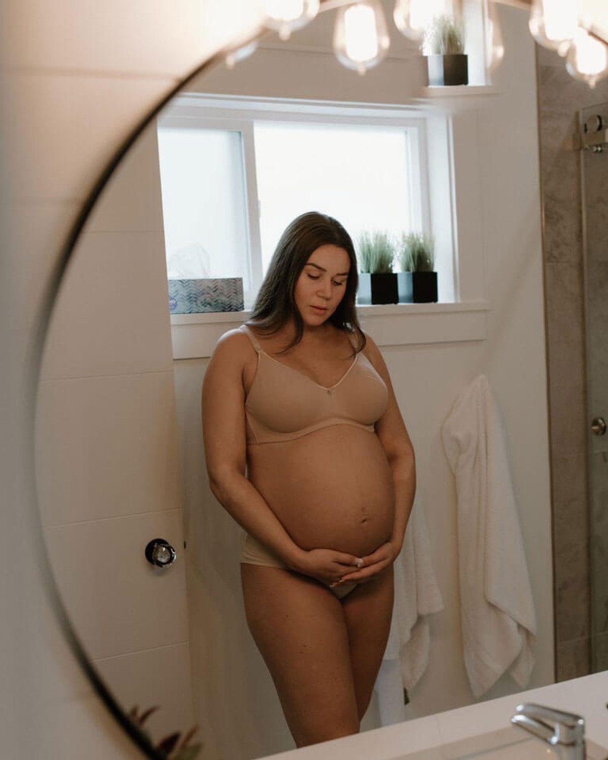 pregnant woman in the mirror